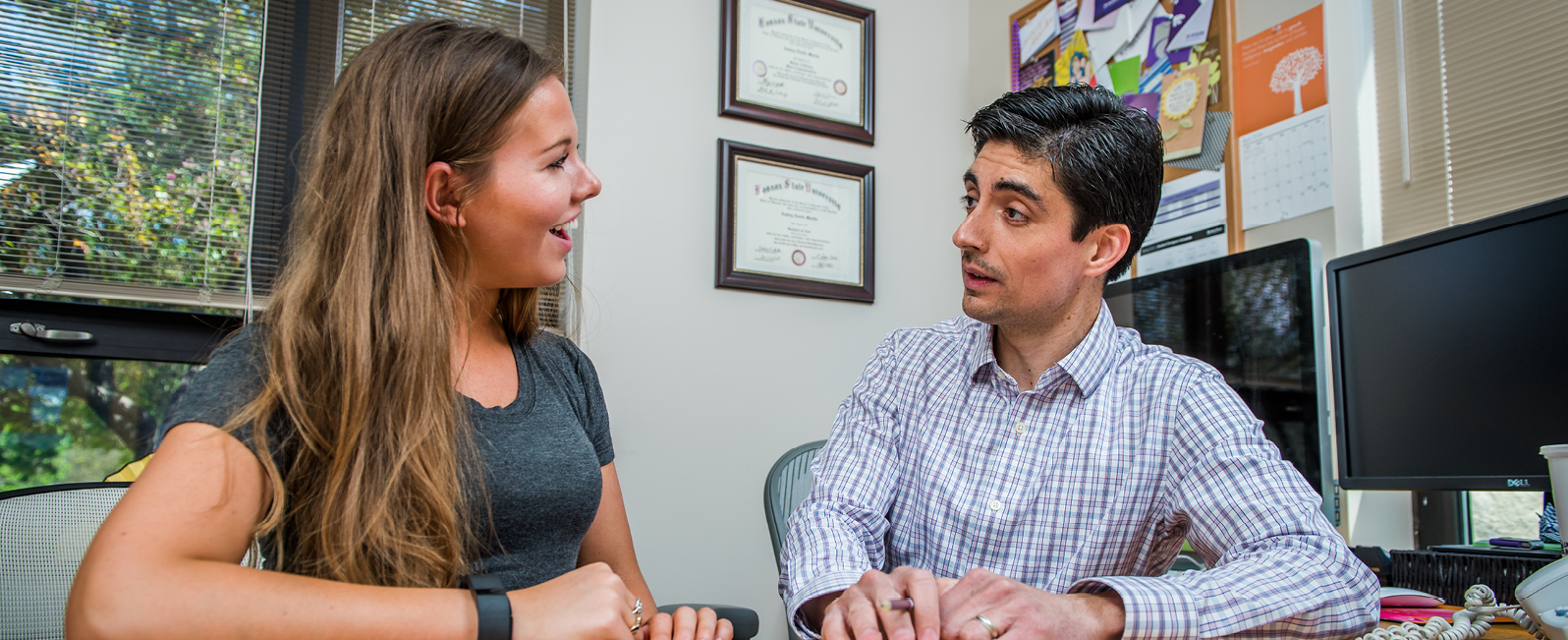 student consulting with financial aid advisor